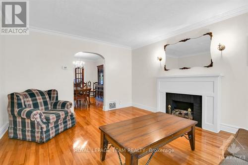 128&130 Bayswater Avenue, Ottawa, ON - Indoor Photo Showing Living Room With Fireplace