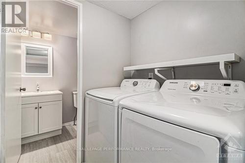 75 Sandwalk, Ottawa, ON - Indoor Photo Showing Laundry Room