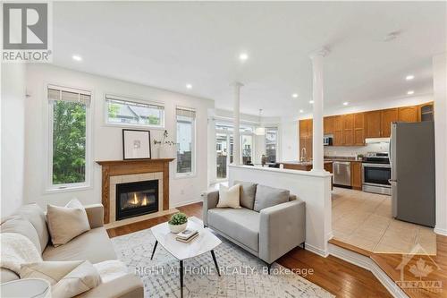 126 Strathcarron Crescent, Ottawa, ON - Indoor Photo Showing Living Room With Fireplace