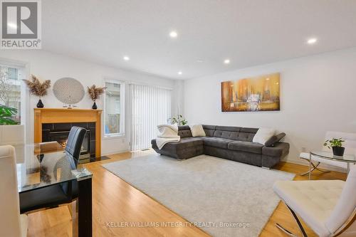 11 Santa Cruz, Ottawa, ON - Indoor Photo Showing Living Room With Fireplace