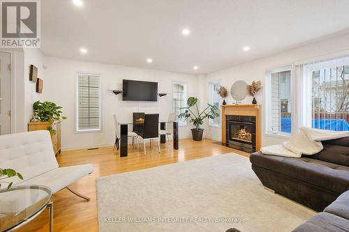 11 Santa Cruz, Ottawa, ON - Indoor Photo Showing Living Room With Fireplace