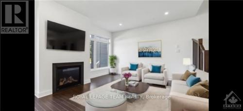 213 Bristol Crescent, North Grenville, ON - Indoor Photo Showing Living Room With Fireplace