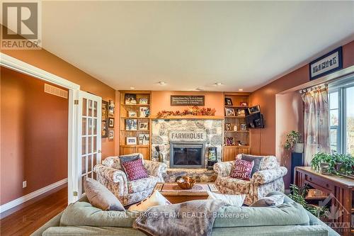 6443 Martin Street, Mississippi Mills, ON - Indoor Photo Showing Living Room With Fireplace