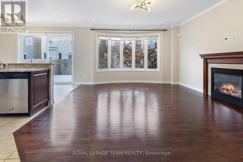 421 Meadowhawk Crescent, Ottawa, ON - Indoor Photo Showing Living Room With Fireplace