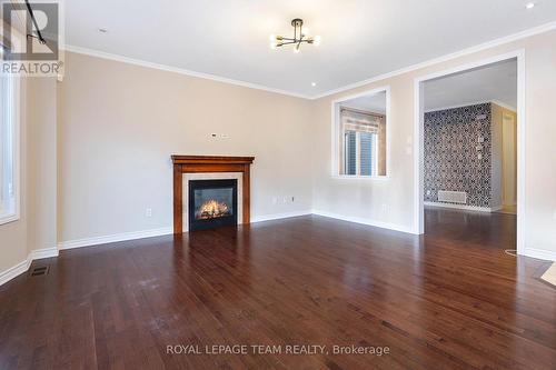 421 Meadowhawk Crescent, Ottawa, ON - Indoor Photo Showing Living Room With Fireplace