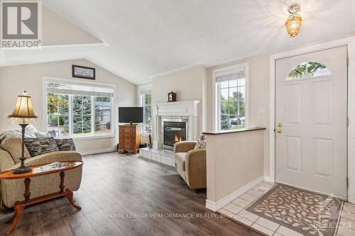 1012 Teena Colleen, Ottawa, ON - Indoor Photo Showing Living Room With Fireplace