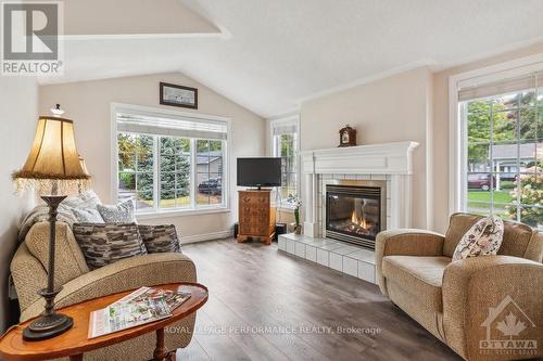 1012 Teena Colleen, Ottawa, ON - Indoor Photo Showing Living Room With Fireplace