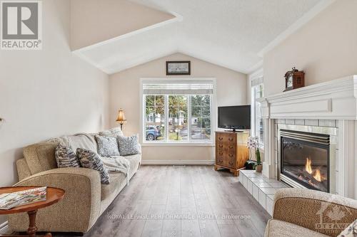 1012 Teena Colleen, Ottawa, ON - Indoor Photo Showing Living Room With Fireplace