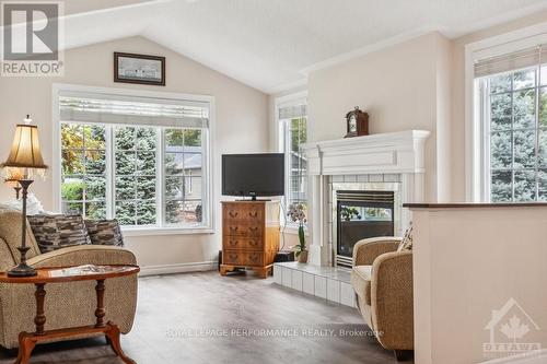 1012 Teena Colleen, Ottawa, ON - Indoor Photo Showing Living Room With Fireplace