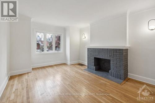 124 Blackburn Avenue, Ottawa, ON - Indoor Photo Showing Living Room With Fireplace