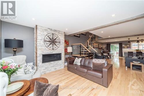 441 Hartleigh Avenue, Ottawa, ON - Indoor Photo Showing Living Room With Fireplace