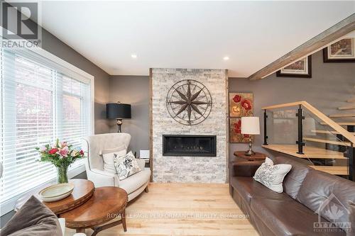 441 Hartleigh Avenue, Ottawa, ON - Indoor Photo Showing Living Room With Fireplace