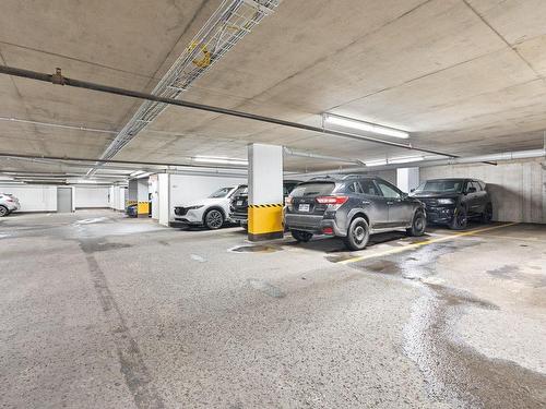 Parking - 308-1425 Rue Isabelle-Aubert, Québec (Les Rivières), QC - Indoor Photo Showing Garage