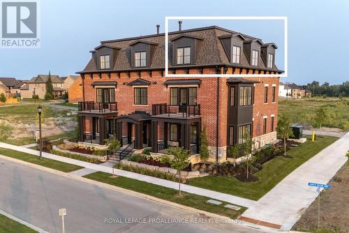 301 - 941 Charles Wilson Parkway, Cobourg, ON - Outdoor With Facade