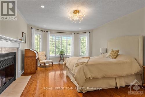 136 Kerscott Heights Way, Ottawa, ON - Indoor Photo Showing Bedroom With Fireplace