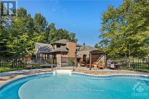 136 Kerscott Heights Way, Ottawa, ON - Outdoor With In Ground Pool With Backyard