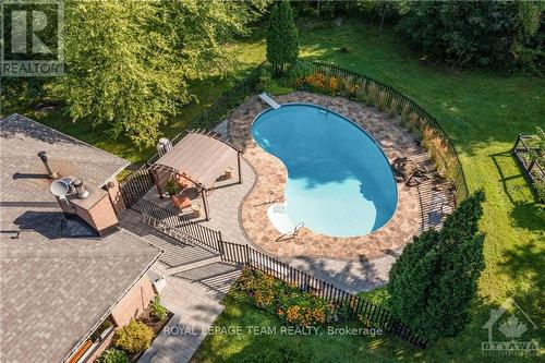 136 Kerscott Heights Way, Ottawa, ON - Outdoor With In Ground Pool