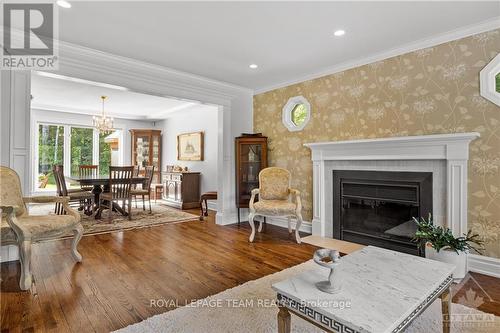 136 Kerscott Heights Way, Ottawa, ON - Indoor Photo Showing Living Room With Fireplace