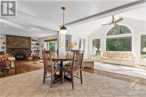 136 Kerscott Heights Way, Ottawa, ON - Indoor Photo Showing Dining Room With Fireplace