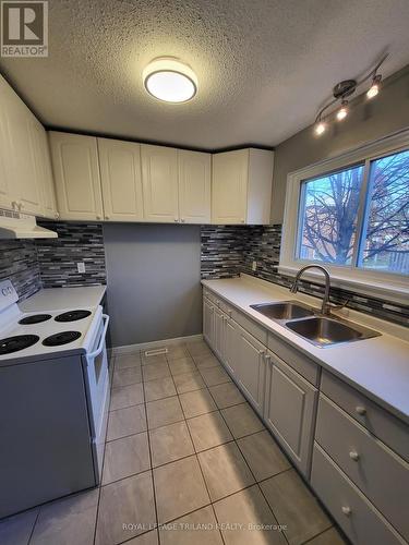 66 - 585 Gainsborough Road, London, ON - Indoor Photo Showing Kitchen With Double Sink