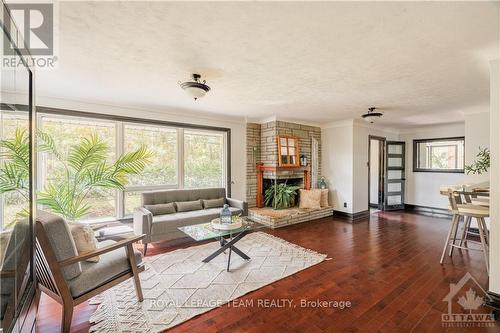 5478 Mitch Owens Road, Ottawa, ON - Indoor Photo Showing Living Room With Fireplace