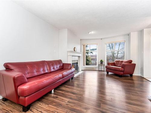 309-898 Vernon Ave, Saanich, BC - Indoor Photo Showing Living Room With Fireplace