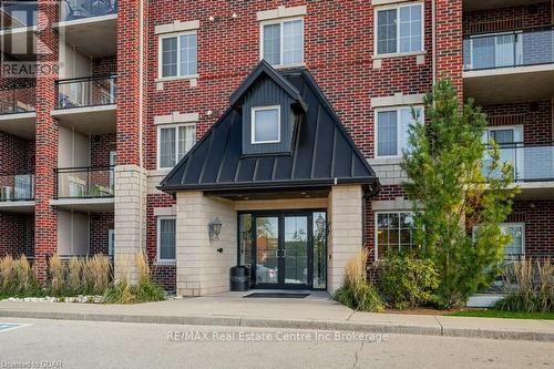 113 - 1440 Gordon Street, Guelph (Pine Ridge), ON - Outdoor With Balcony With Facade