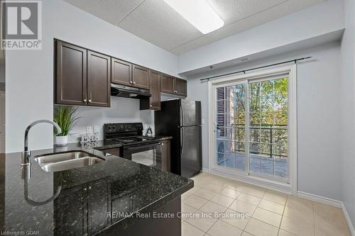 113 - 1440 Gordon Street, Guelph (Pine Ridge), ON - Indoor Photo Showing Kitchen With Double Sink