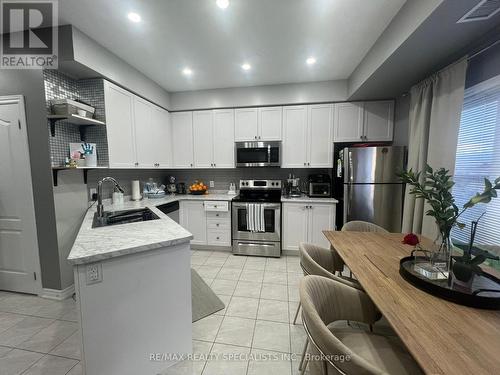 209 - 3865 Major Mackenzie Drive W, Vaughan, ON - Indoor Photo Showing Kitchen With Stainless Steel Kitchen