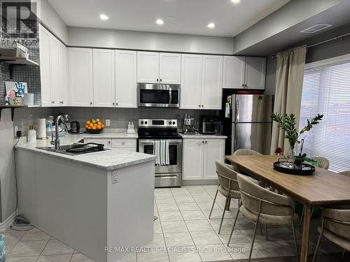 209 - 3865 Major Mackenzie Drive W, Vaughan, ON - Indoor Photo Showing Kitchen With Stainless Steel Kitchen