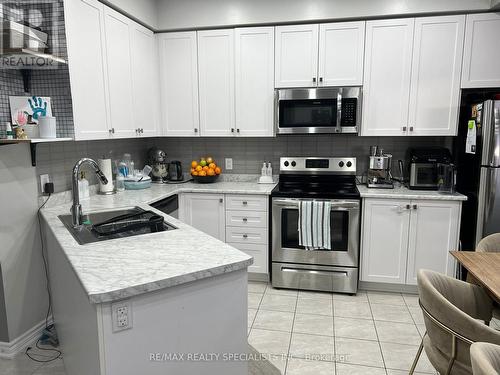 209 - 3865 Major Mackenzie Drive W, Vaughan, ON - Indoor Photo Showing Kitchen With Stainless Steel Kitchen