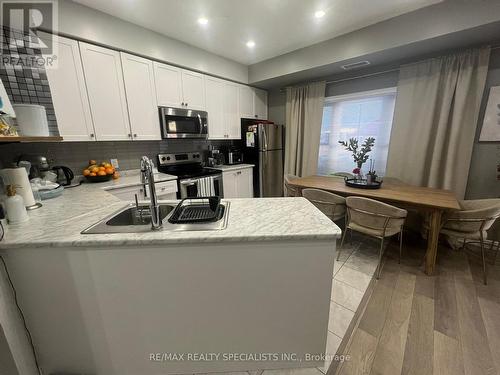 209 - 3865 Major Mackenzie Drive W, Vaughan, ON - Indoor Photo Showing Kitchen With Double Sink