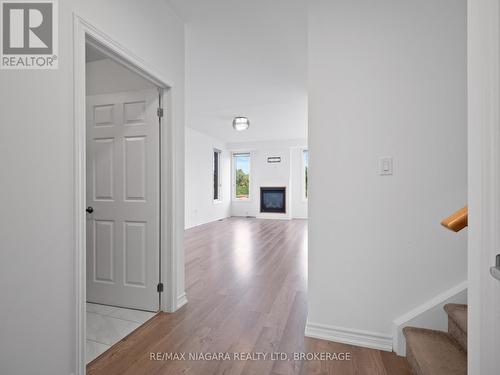 1478 Marina Drive, Fort Erie (334 - Crescent Park), ON - Indoor Photo Showing Other Room With Fireplace