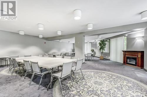 Dining area with concrete floors and a baseboard radiator - 77 Governors Road Unit# 501, Dundas, ON - Indoor