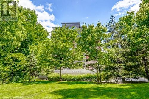 Surrounding community featuring a lawn - 77 Governors Road Unit# 501, Dundas, ON - Outdoor