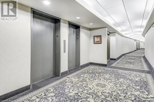 Hallway featuring elevator - 77 Governors Road Unit# 501, Dundas, ON - Indoor Photo Showing Other Room