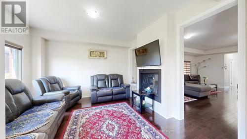 220 Fleetwood Drive, Oshawa, ON - Indoor Photo Showing Living Room With Fireplace