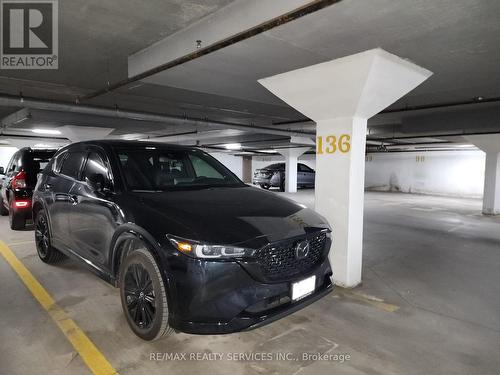 212 - 7405 Goreway Drive W, Mississauga, ON - Indoor Photo Showing Garage