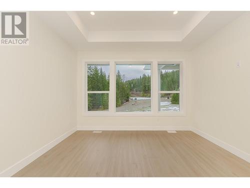 Primary Bedroom with Beautiful Custom Ceiling - 2504 Fox Glen Way Lot# 11, Blind Bay, BC - Indoor Photo Showing Other Room