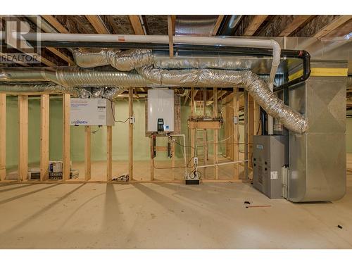 On demand hot water, high efficiency furnace, HRV Air System - 2504 Fox Glen Way Lot# 11, Blind Bay, BC - Indoor Photo Showing Basement