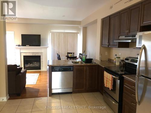 16 - 541 Winston Road, Grimsby, ON - Indoor Photo Showing Kitchen With Fireplace With Stainless Steel Kitchen