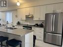 10 Simona Avenue, Wasaga Beach, ON  - Indoor Photo Showing Kitchen With Double Sink 