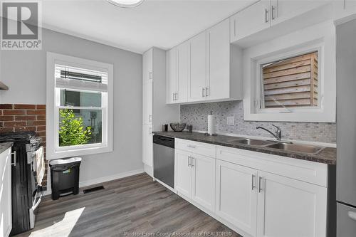 64 Moore Street, Wheatley, ON - Indoor Photo Showing Kitchen With Double Sink