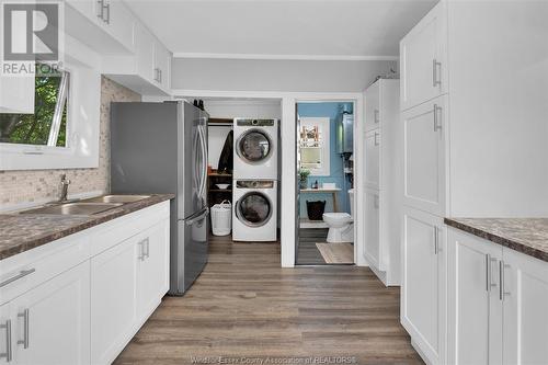 64 Moore Street, Wheatley, ON - Indoor Photo Showing Kitchen With Double Sink