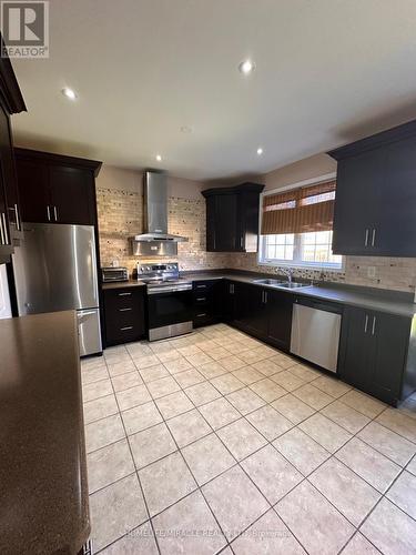 20 Latania Boulevard, Brampton, ON - Indoor Photo Showing Kitchen With Double Sink