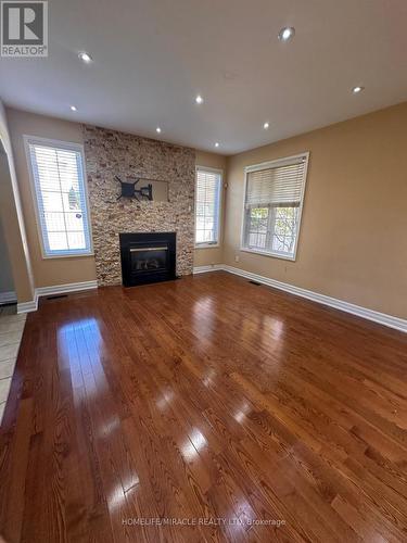 20 Latania Boulevard, Brampton, ON - Indoor Photo Showing Living Room With Fireplace