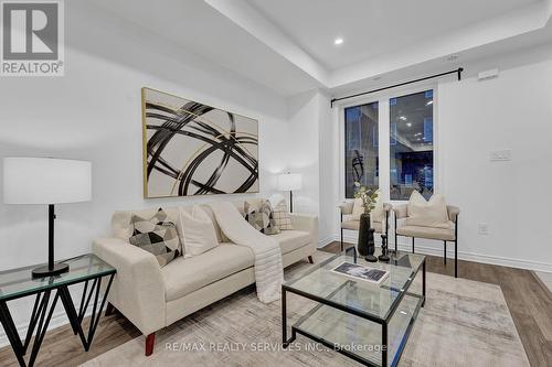 12 - 35 Heron Park Place, Toronto, ON - Indoor Photo Showing Living Room