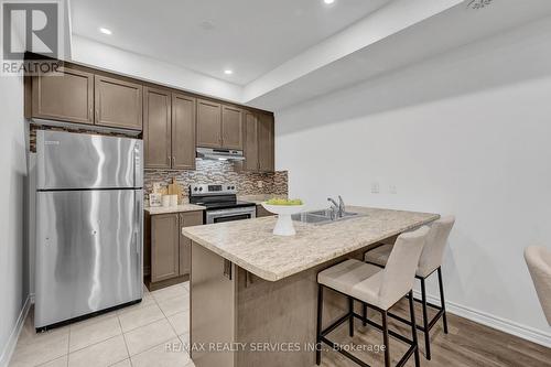 12 - 35 Heron Park Place, Toronto, ON - Indoor Photo Showing Kitchen With Double Sink