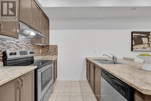 12 - 35 Heron Park Place, Toronto, ON - Indoor Photo Showing Kitchen With Double Sink