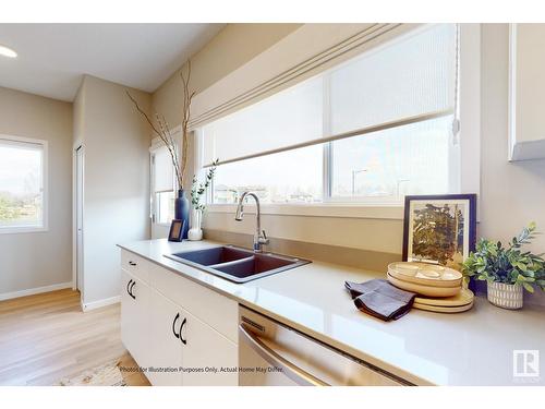 648 174 Av Ne, Edmonton, AB - Indoor Photo Showing Kitchen With Double Sink